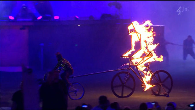 2012 World Olympic Games Paralympics Closing Ceremony burning man on bike