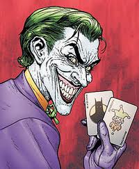 The joker holding playing cards