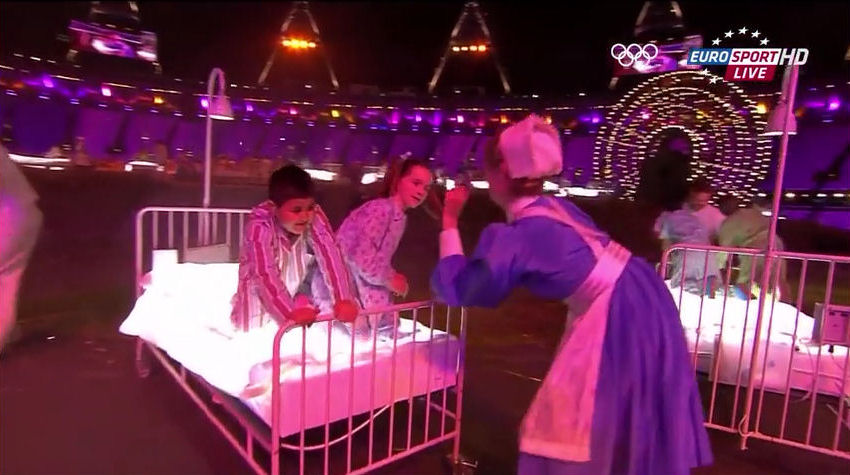 2012 Olympics opening ceremony NHS hospital beds with children><img src=