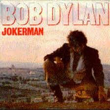Bob Dylan Jokerman crouching