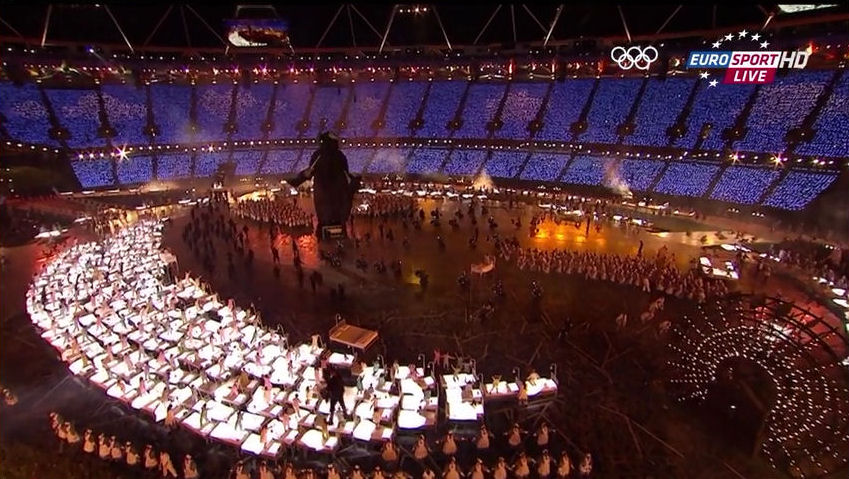2012 Olympics opening ceremony ferris wheel tunnel lit with concentric circles